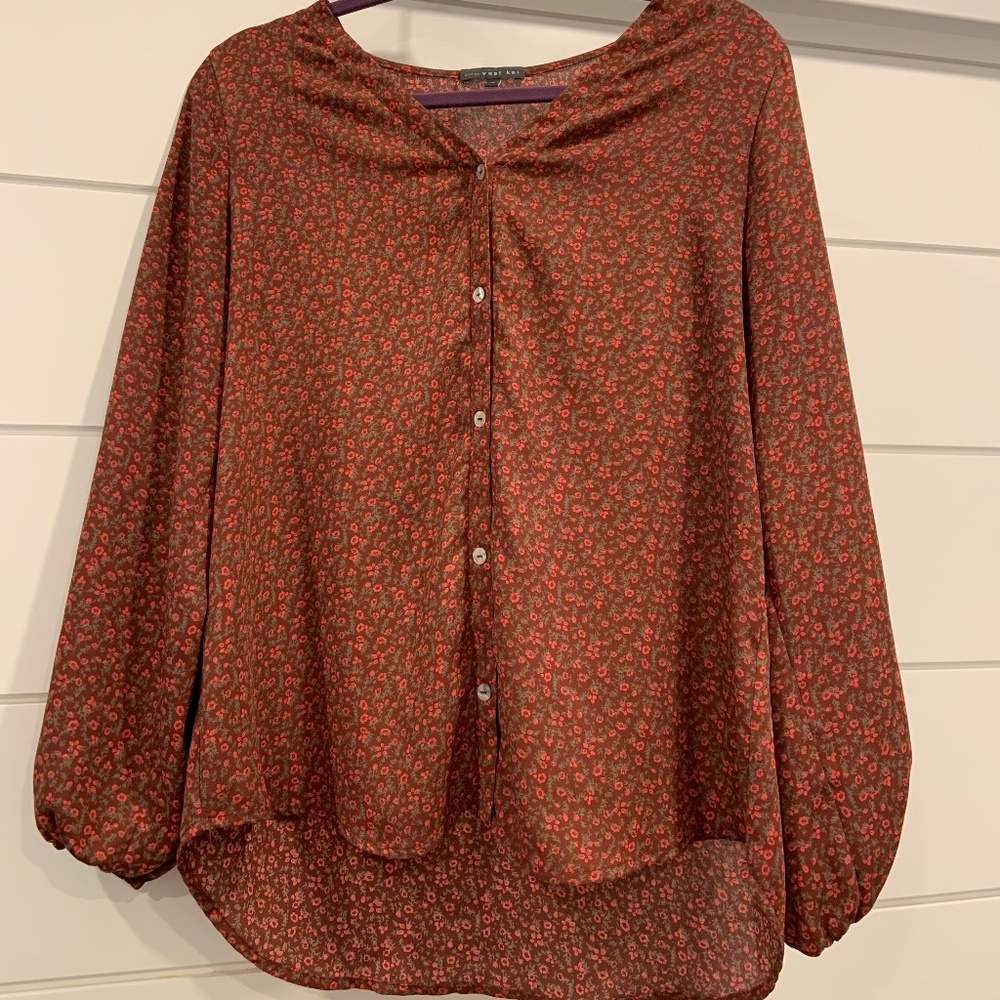 Red floral blouse
